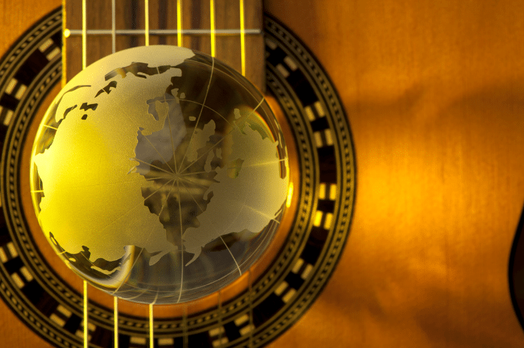cours de guitare à domicile icm musiques du monde
